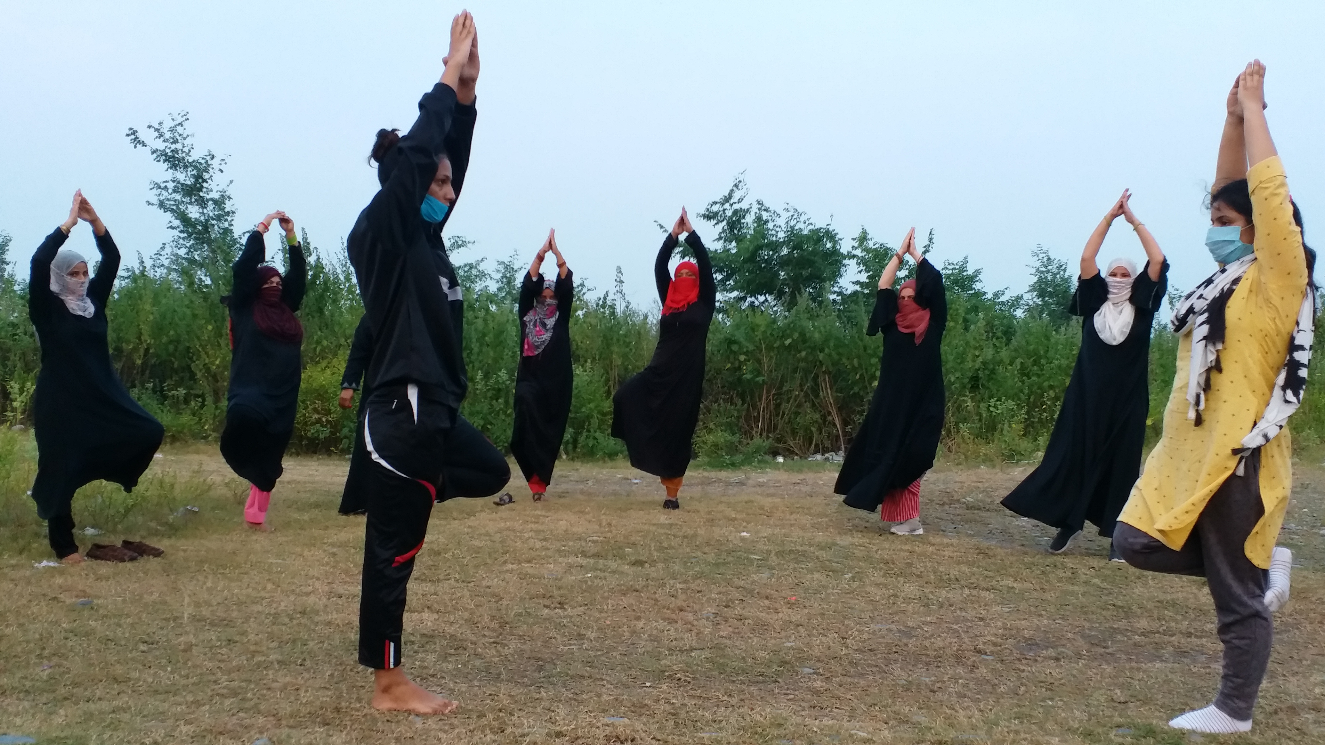 muslim women doing yoga