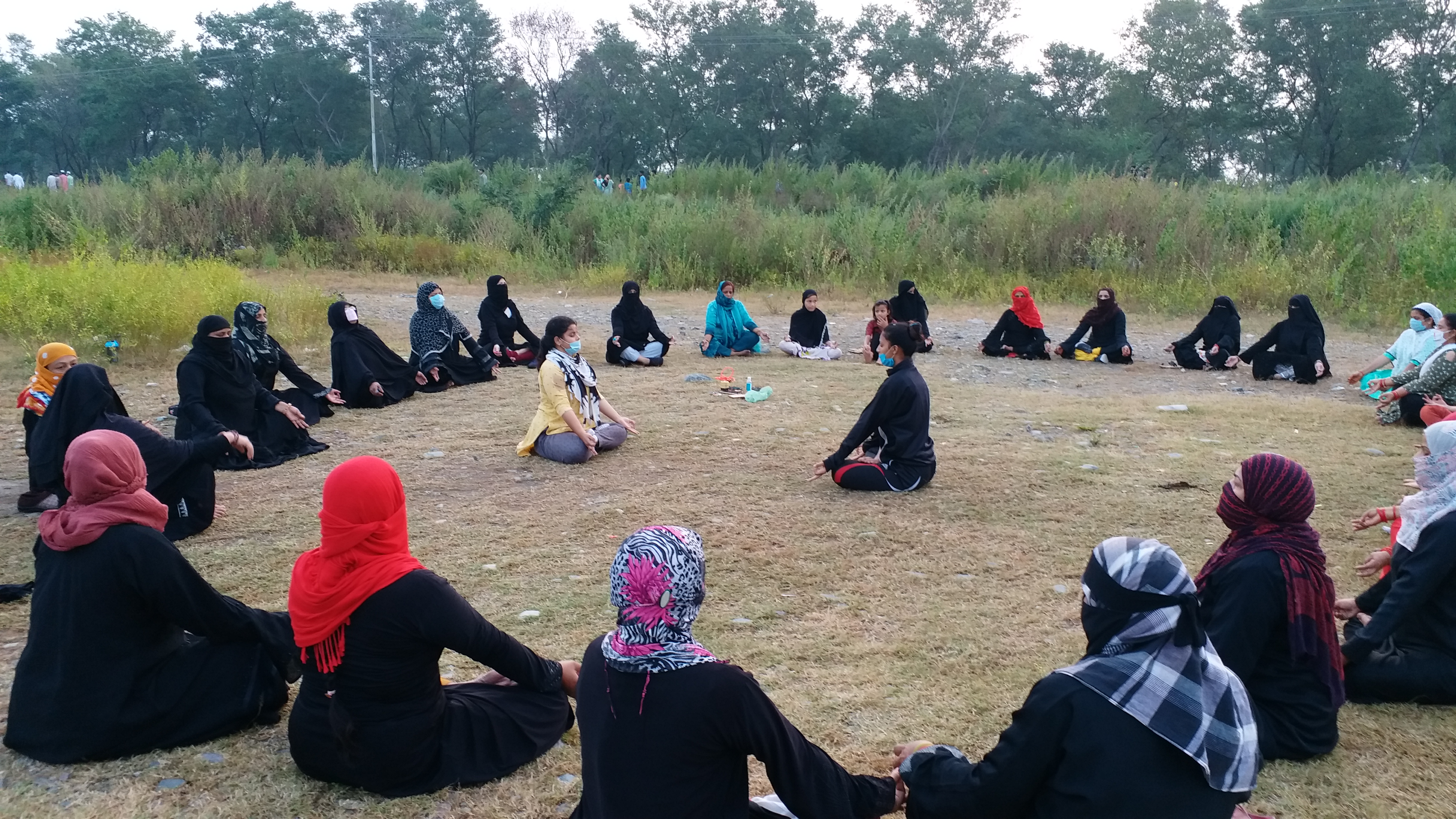 muslim women doing yoga