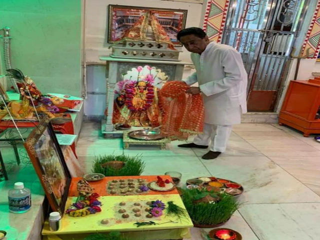 Former CM worshiping in the temple