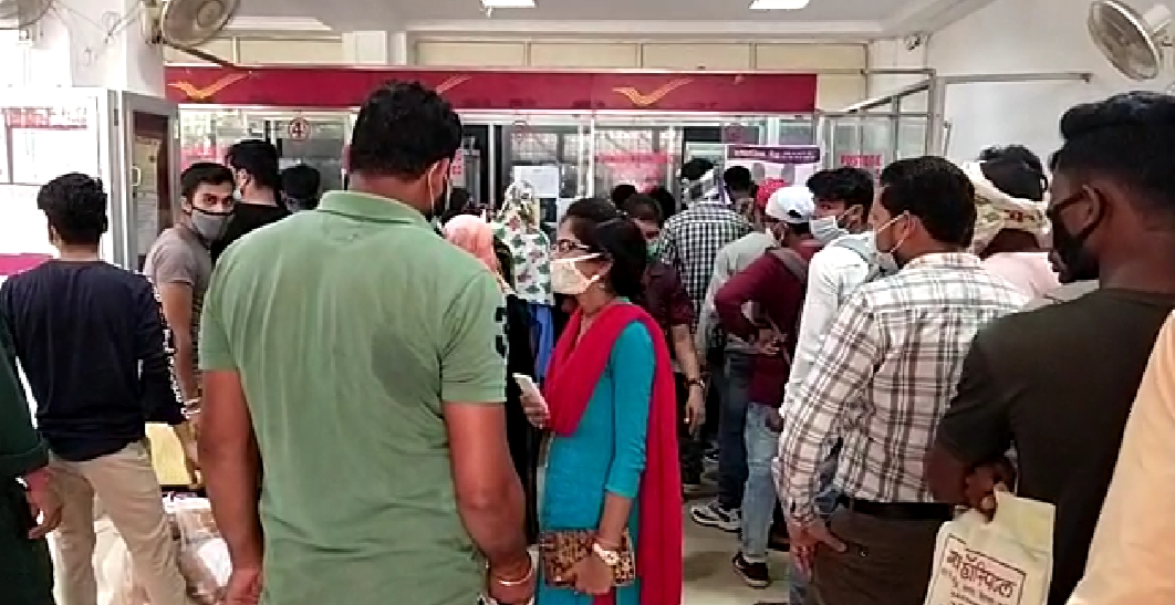 Crowds of students outside the post office to submit answer books in bilaspur