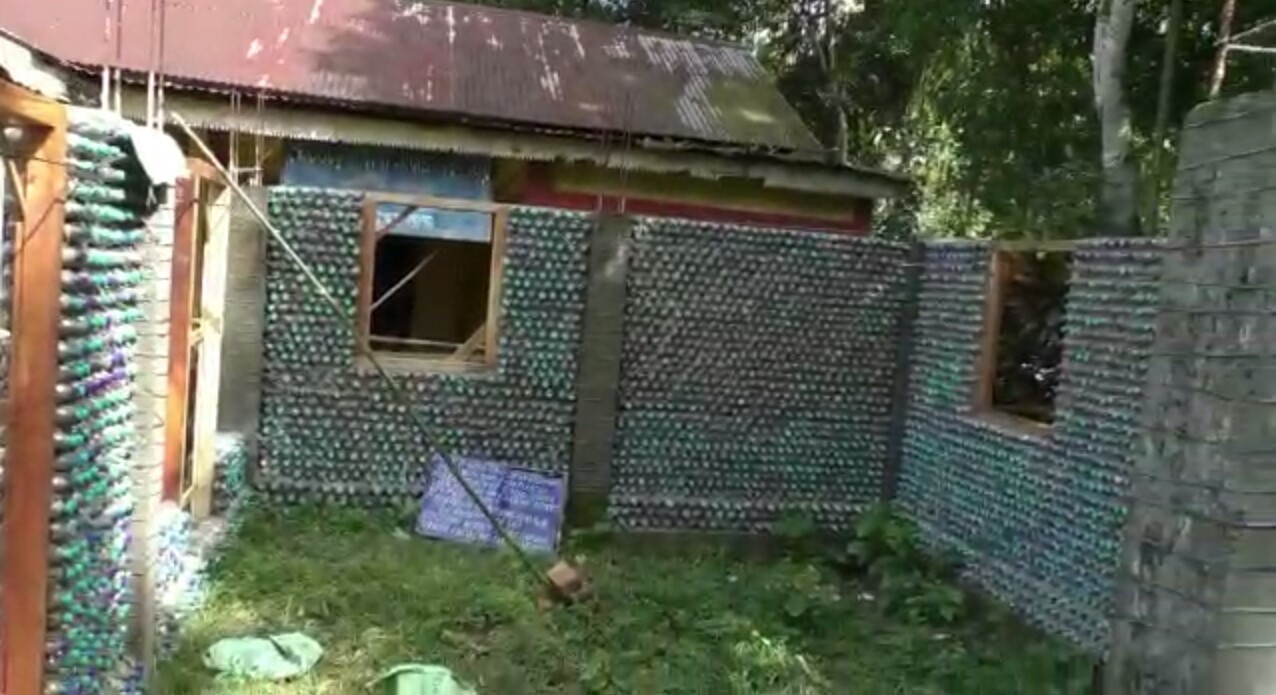 A house made of no bricks, but plastic in Assam