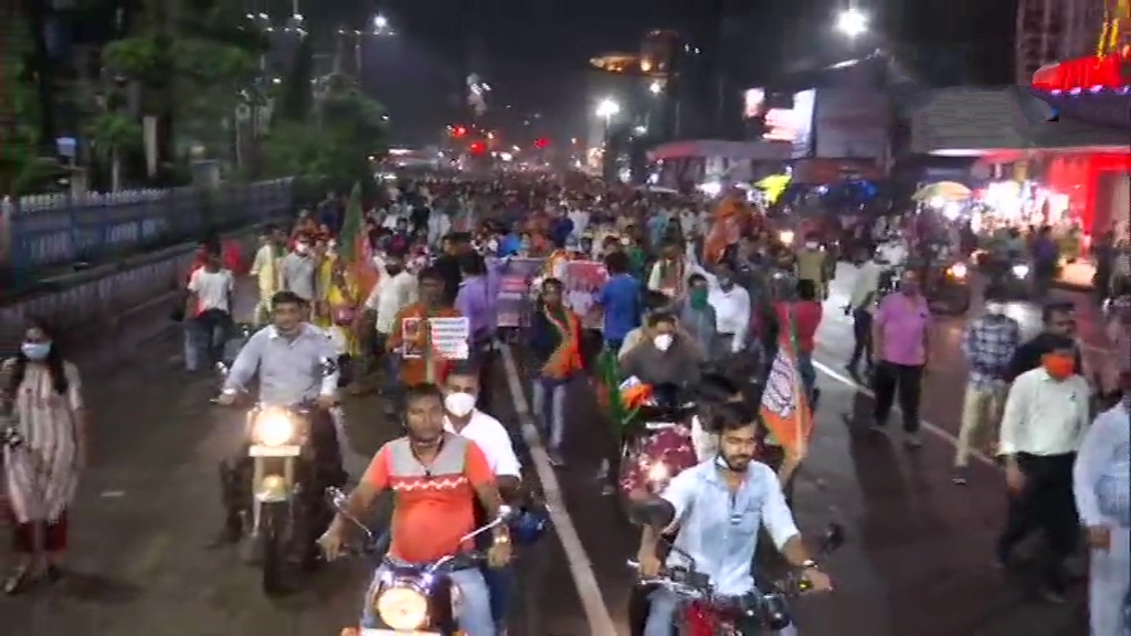 BJP workers hold a candlelight vigil in Kolkata against the state government