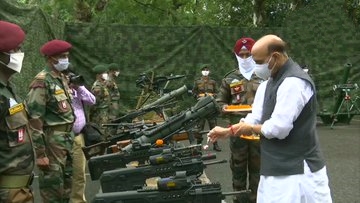 Rajnath Singh performs 'Shastra Puja', says Army won't let anyone take an inch of country's land