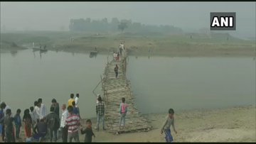 Locals make a temporary bridge in Muzaffarpur