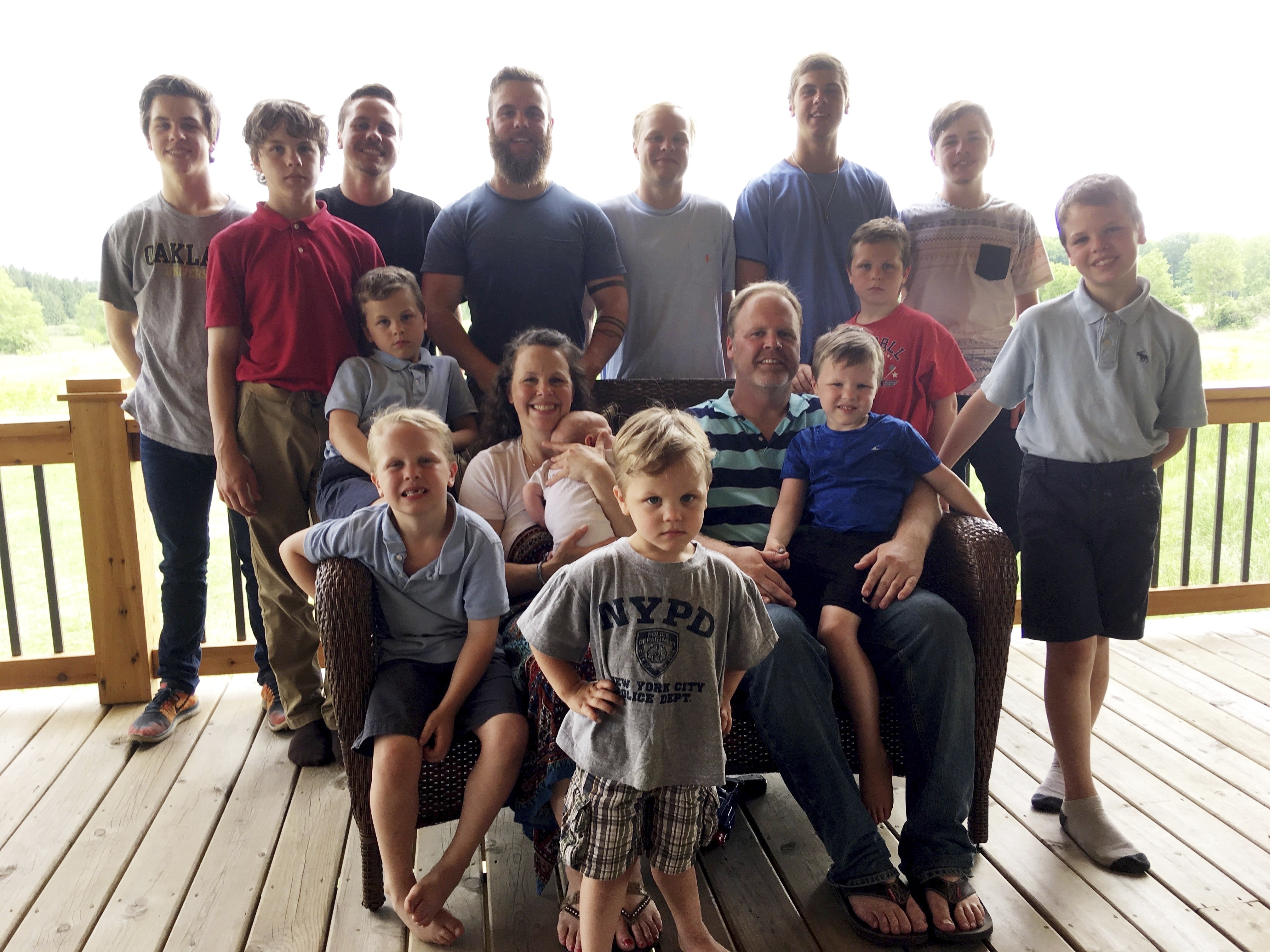 Michigan couple with 14 sons welcome their 1st daughter