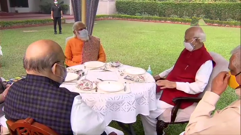 Prime Minister Narendra Modi visits senior BJP leader Lal Krishna Advani's residence to celebrate latter's birthday