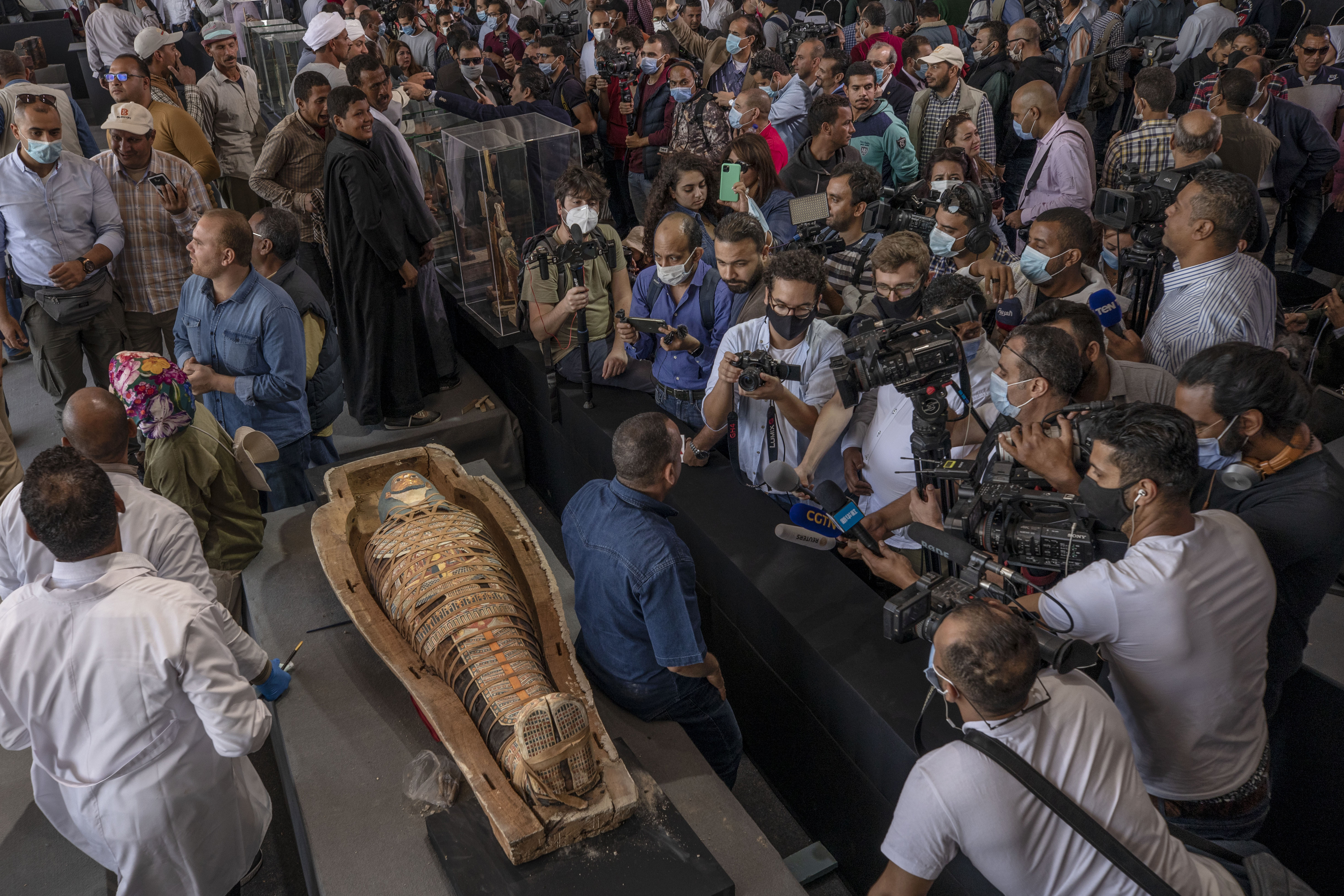 Egypt unveils ancient coffins, statues found in Saqqara