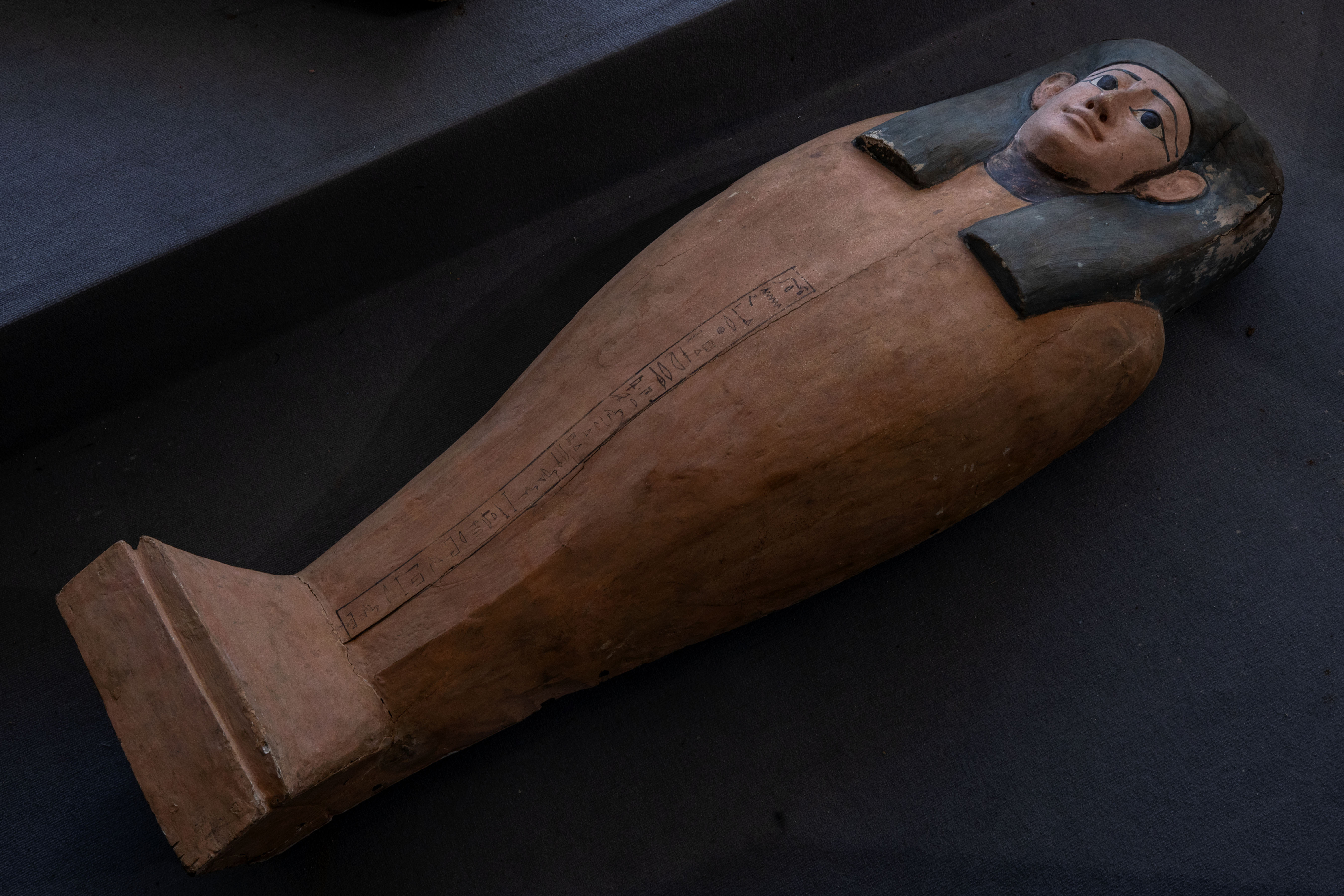 Egypt unveils ancient coffins, statues found in Saqqara