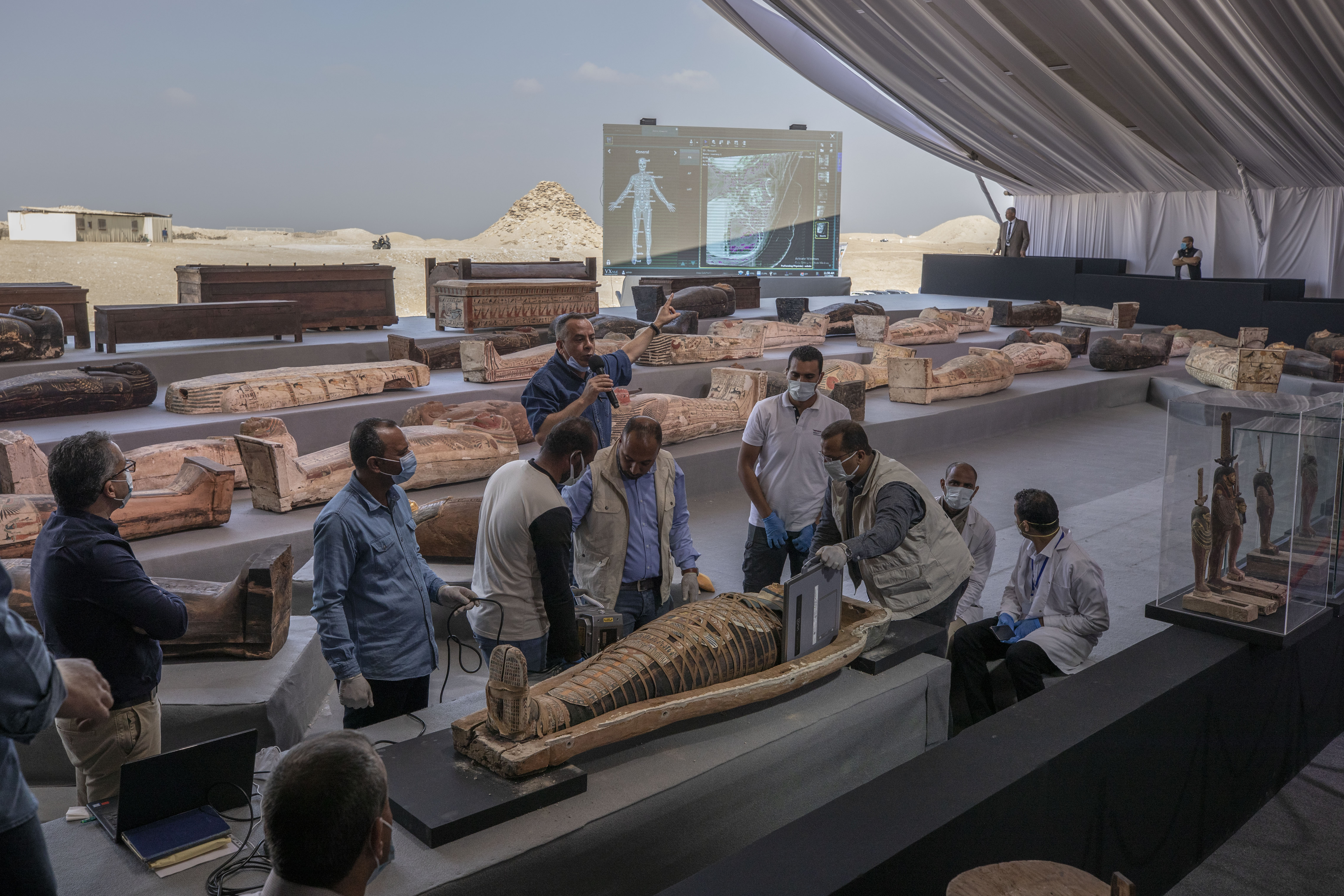 Egypt unveils ancient coffins, statues found in Saqqara