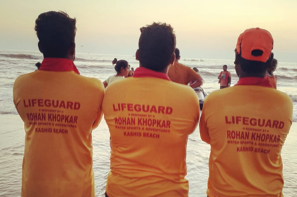 lifeguard saved nine people from drowning in kashid beach raigad