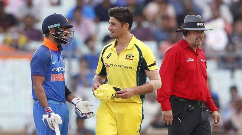 Marcus Stoinis and Virat Kohli