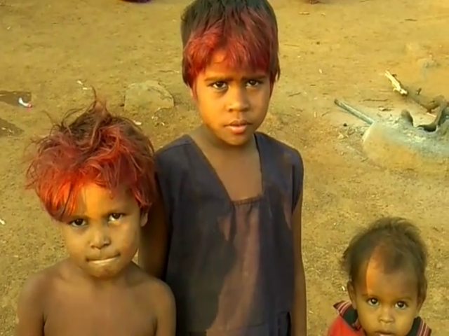 villagers applied red dye on hair to avoid corona