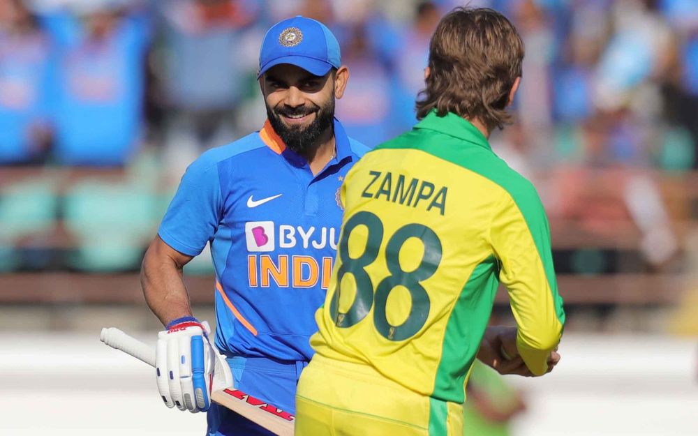 Adam Zampa and Virat Kohli