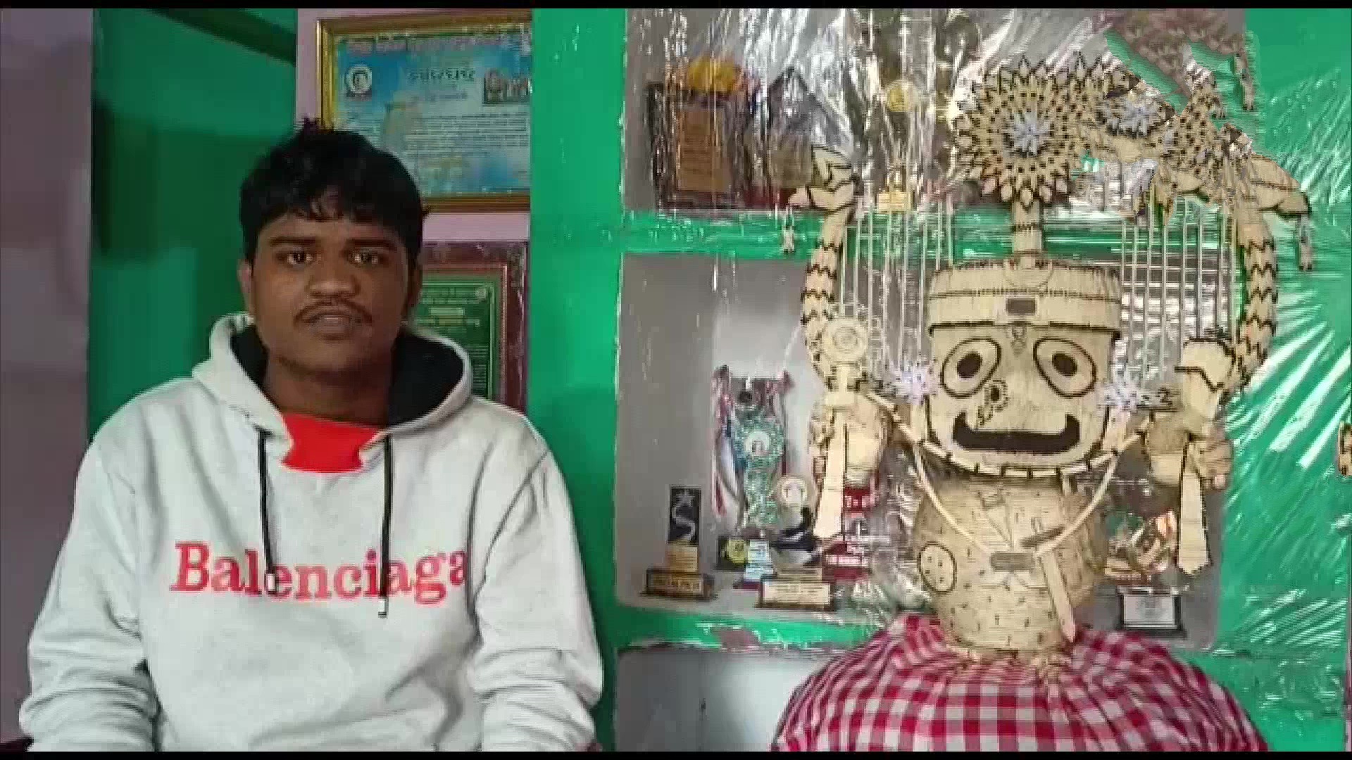 an idol of Lord Jagannath with matchsticks