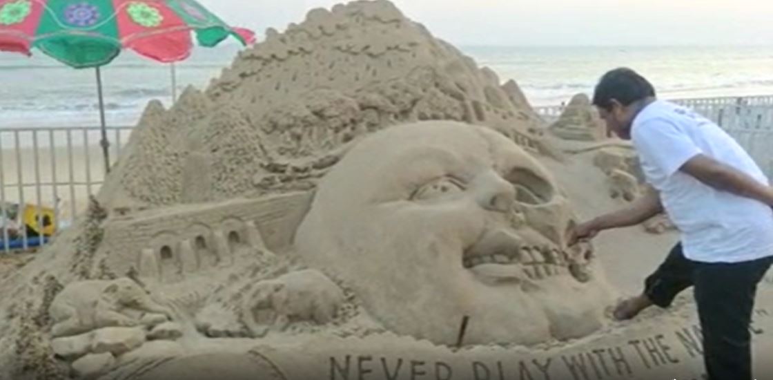 Sand artists creates sculpture to spread awareness in International sand art festival