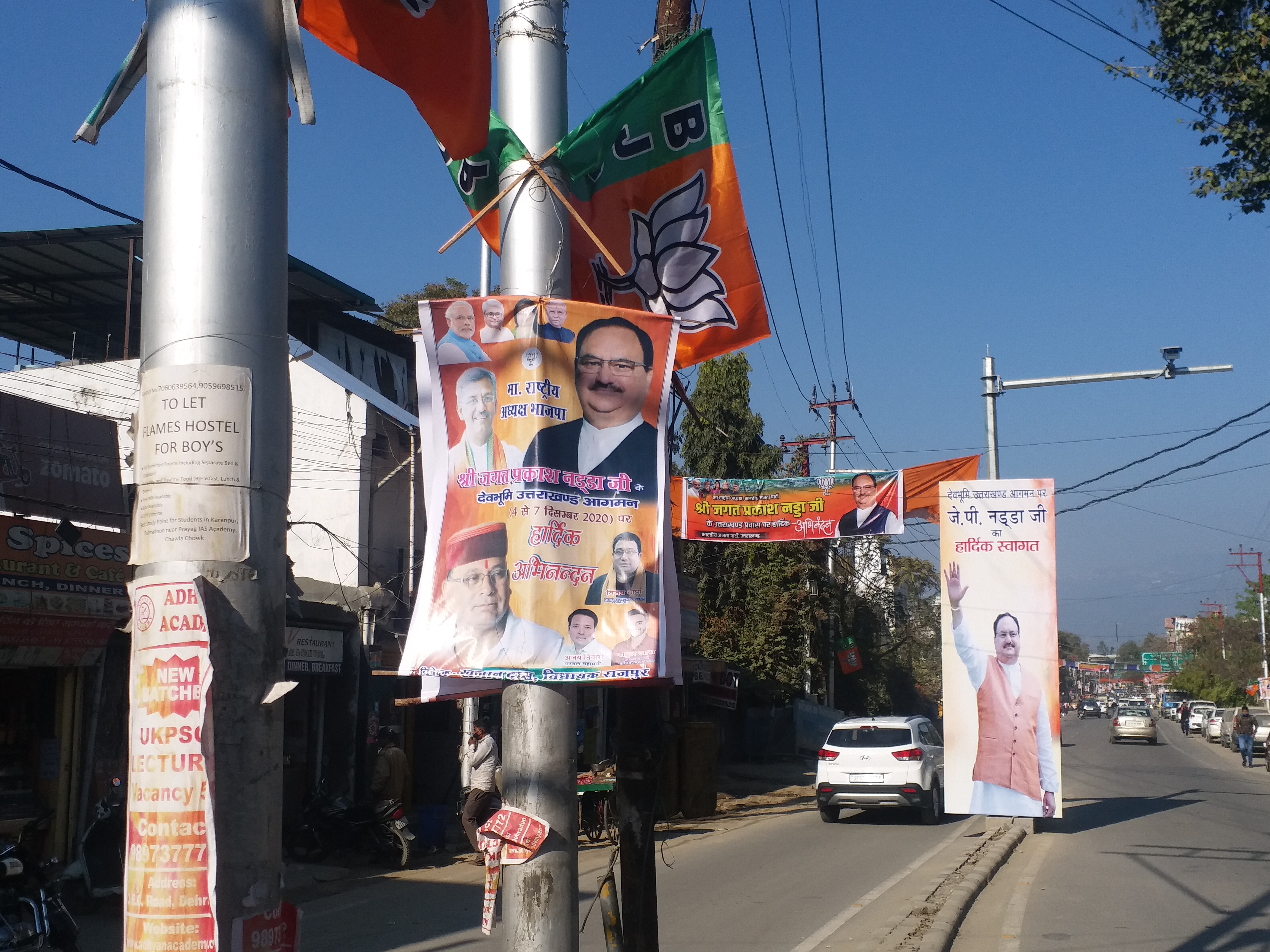 state-president-banshidhar-bhagat-missing-from-poster-banners-in-dehradun