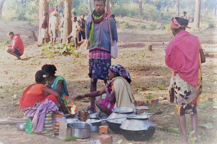 Villagers bring ration during protest