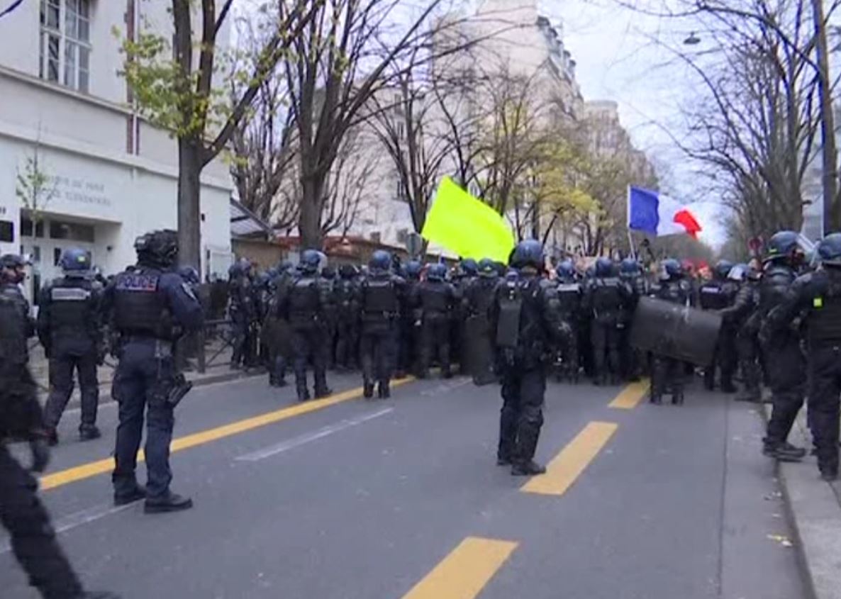 Fires could be seen on the streets in Paris on Saturday as thousands protested