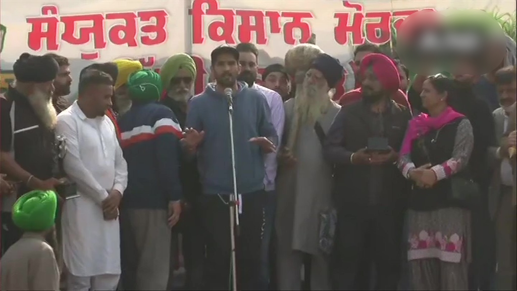 Boxer Vijender Singh joins the farmers' agitation at Singhu border