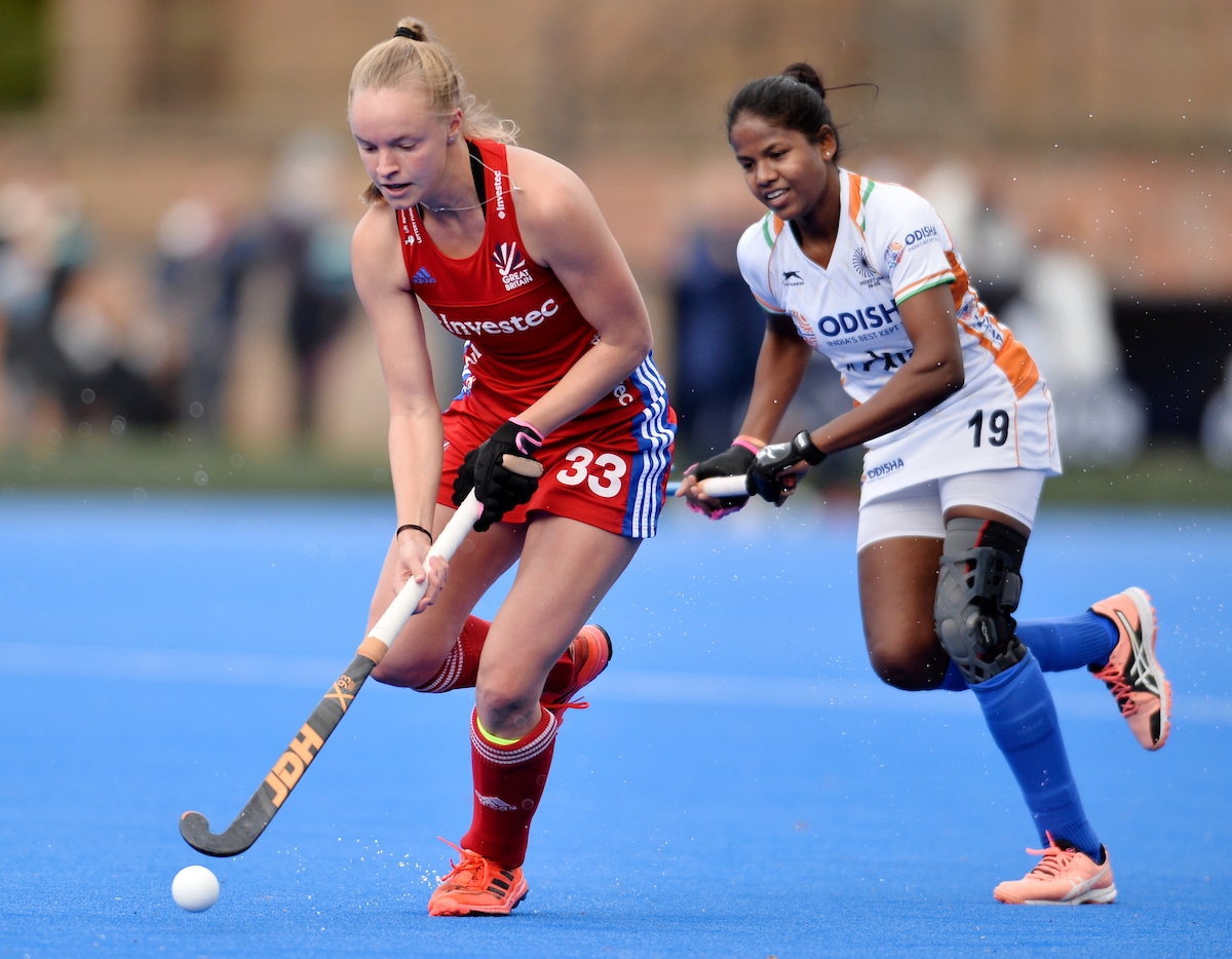 India women's hockey player Namita Toppo is in action in a match against Great Britain.