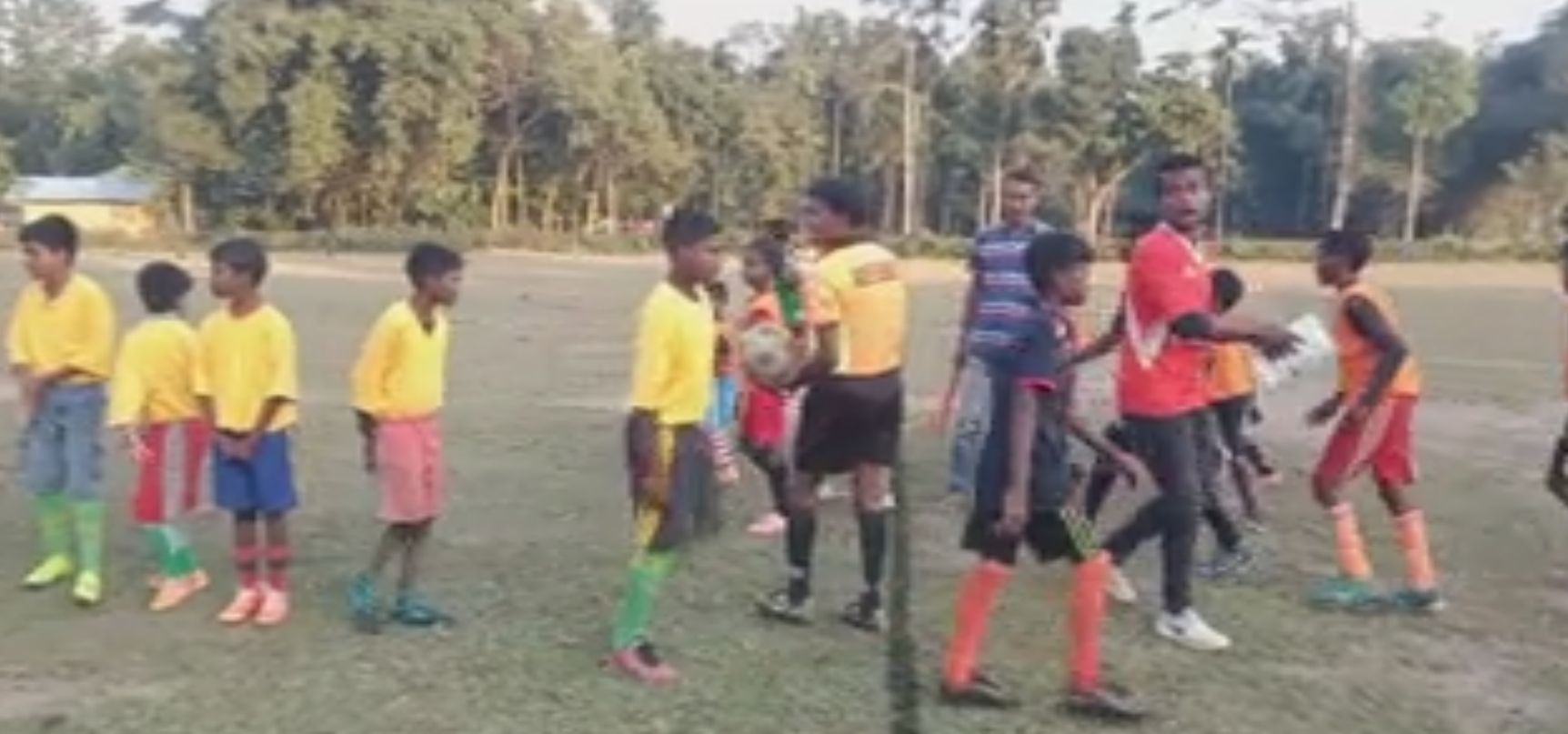 Children playing football in Lahowal field