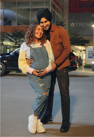 Playback singer Neha Kakkar's post on Instagram has set off rumour mills, leading to speculation about her pregnancy.