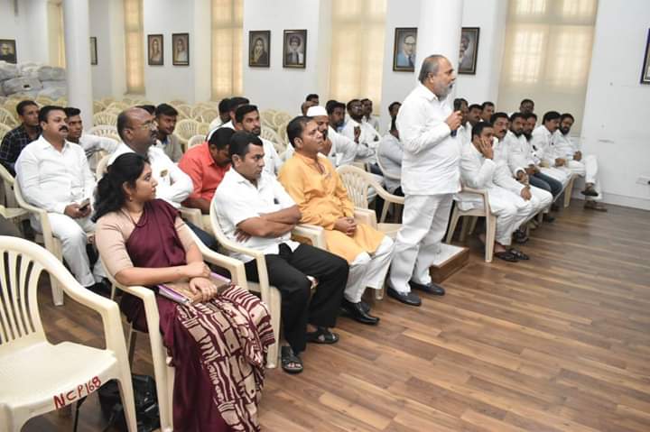 NCP workers in meeting