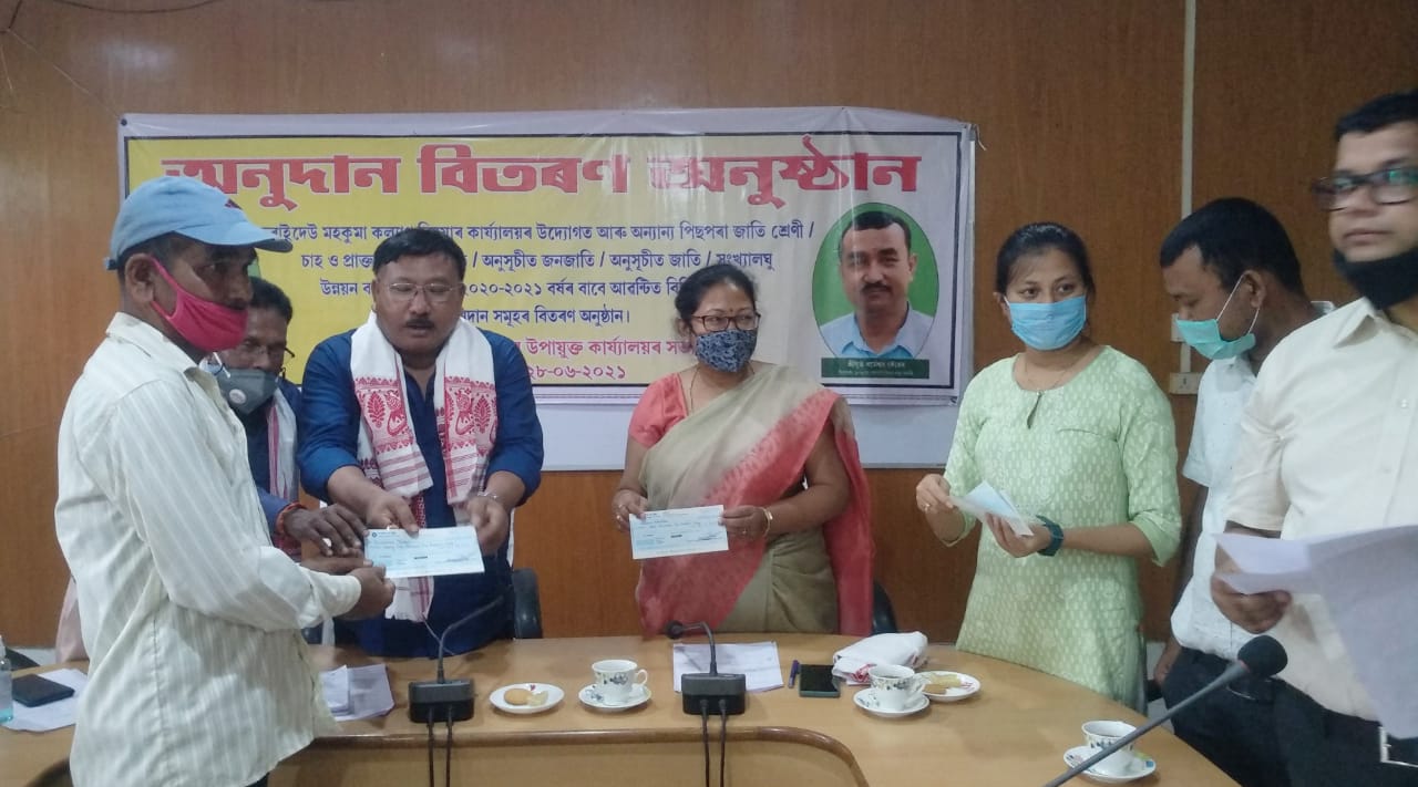 Minister of Disaster management Jogen Mohan giving compensation At Dibrugarh