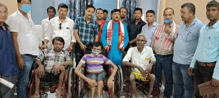 Minister Jogen Mohan distributed wheel chair among physically challenged person