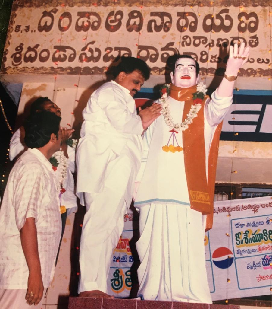 Balasubramanian laying flowers for NTR painting