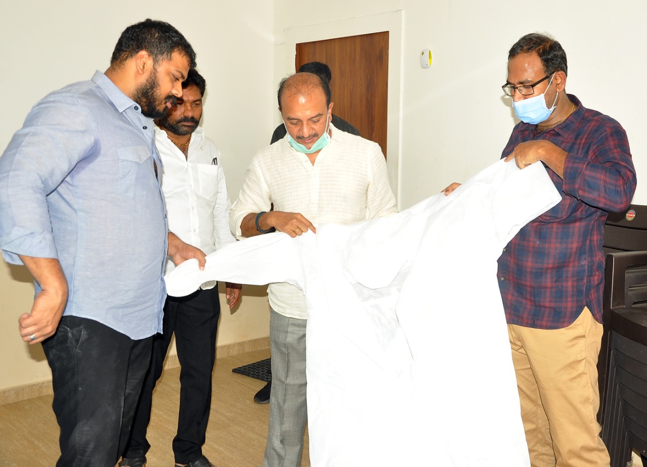 PPE kits by kims hospitals to minister anil kumar