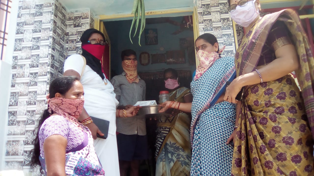 anganwadi activists giving nutritional food to door to door in amadalavalasa mandal