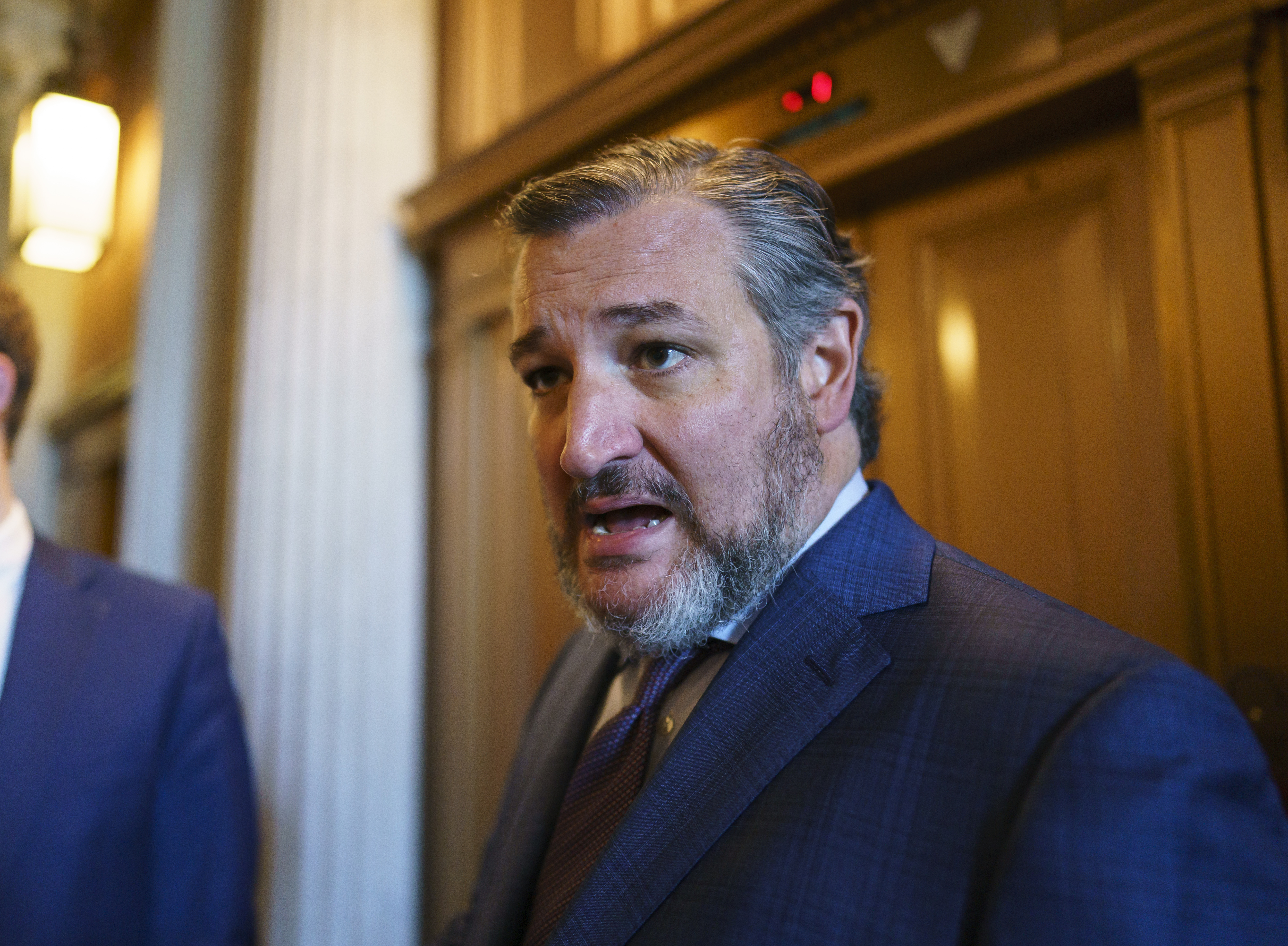 Sen. Ted Cruz, R-Texas, leaves after a Republican luncheon, at the Capitol in Washington.