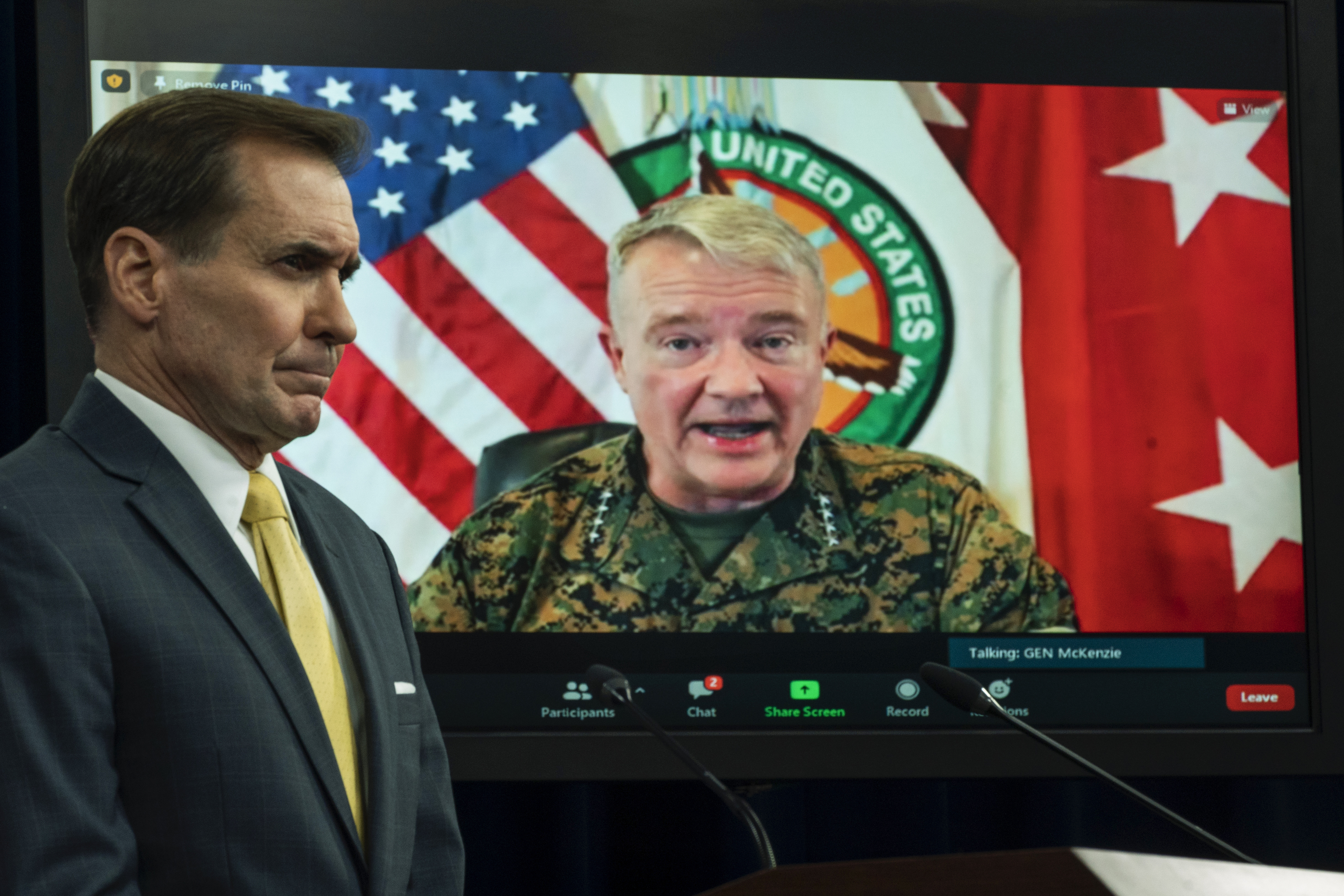 Gen. Frank McKenzie, Commander of the U.S. Central Command, speaks from MacDill Air Force Base, in Tampa, Fla., and appears on a screen as he speaks about the situation in Afghanistan.