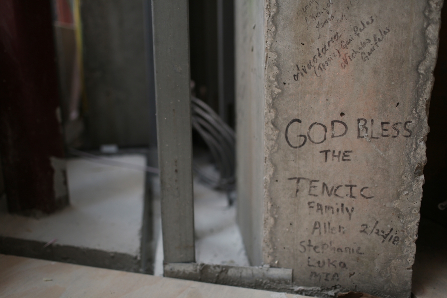 Personal notes, prayers and names are written on the incomplete walls of St. Nicholas Greek Orthodox Church and National Shrine on Thursday, July 22, 2021, in New York. The shrine will have a ceremonial lighting on the eve of the 20th anniversary of the Sept. 11, 2001 attacks, while the interior is slated for completion next year.