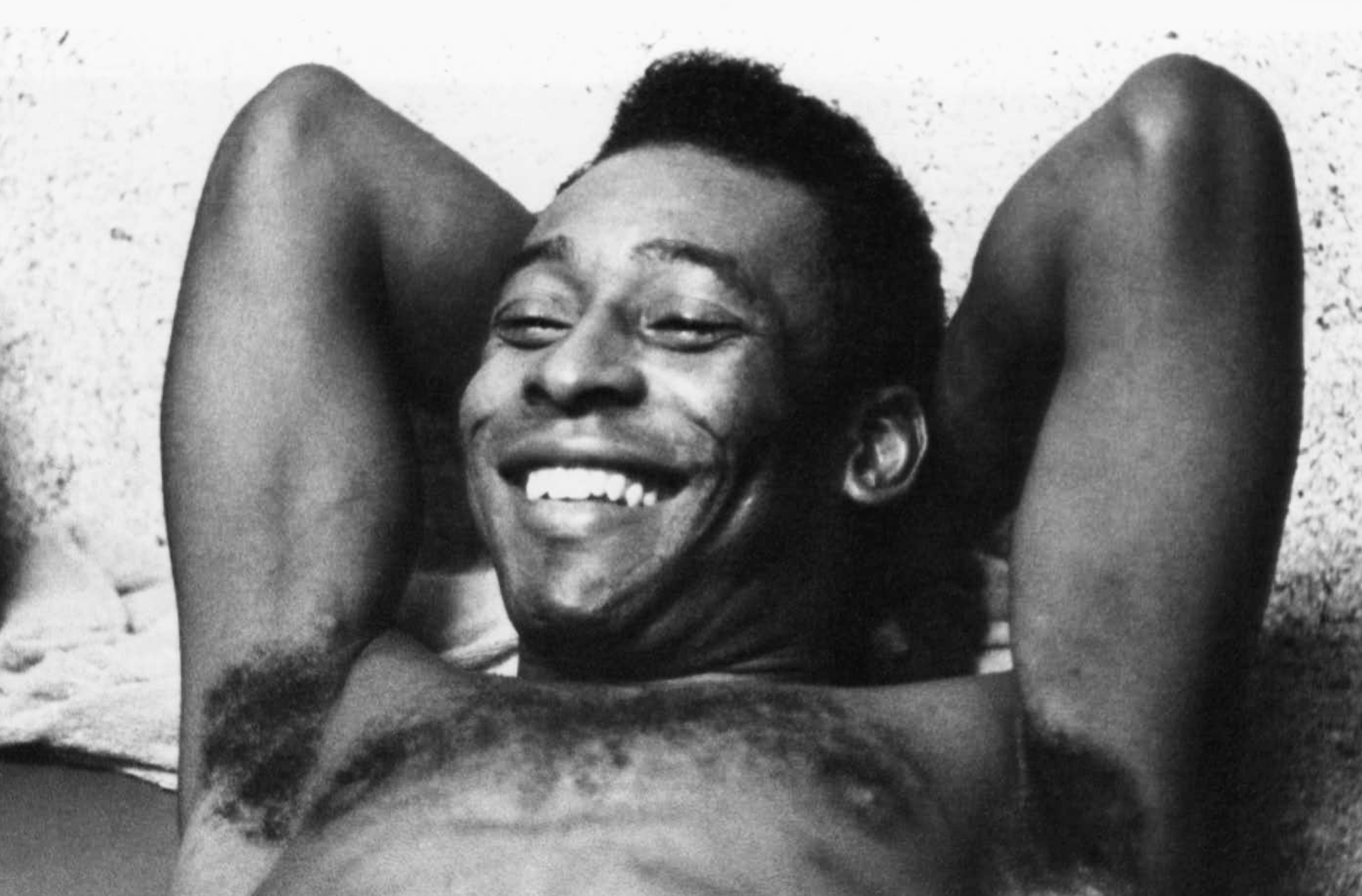 Brazilian soccer star Pele relaxes after a workout in Santos, Brazil, June 3, 1975.