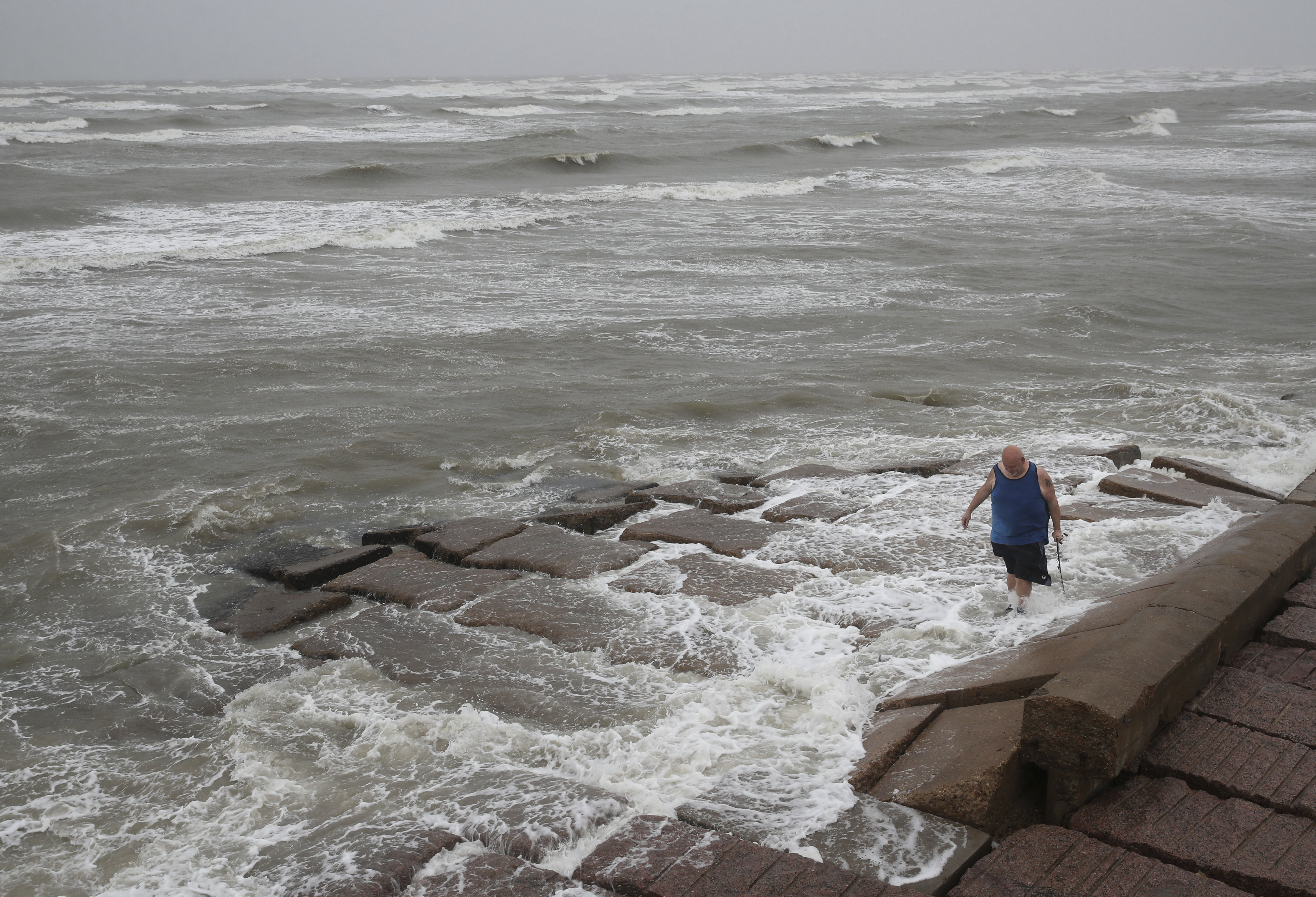 John Pittman, a nurse who works in emergency medicine, fishes to decompress as Tropical Storm Nicholas heads toward Texas