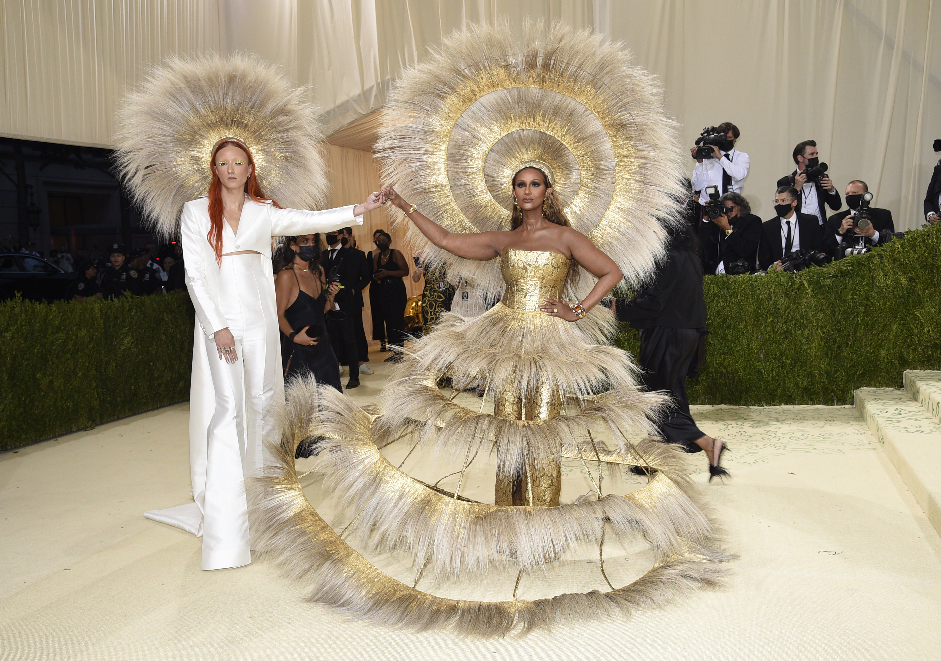 Harris Reed, left, and Iman attend The Metropolitan Museum of Art's Costume Institute benefit gala celebrating the opening of the "In America: A Lexicon of Fashion" exhibition on Monday, Sept. 13, 2021, in New York.