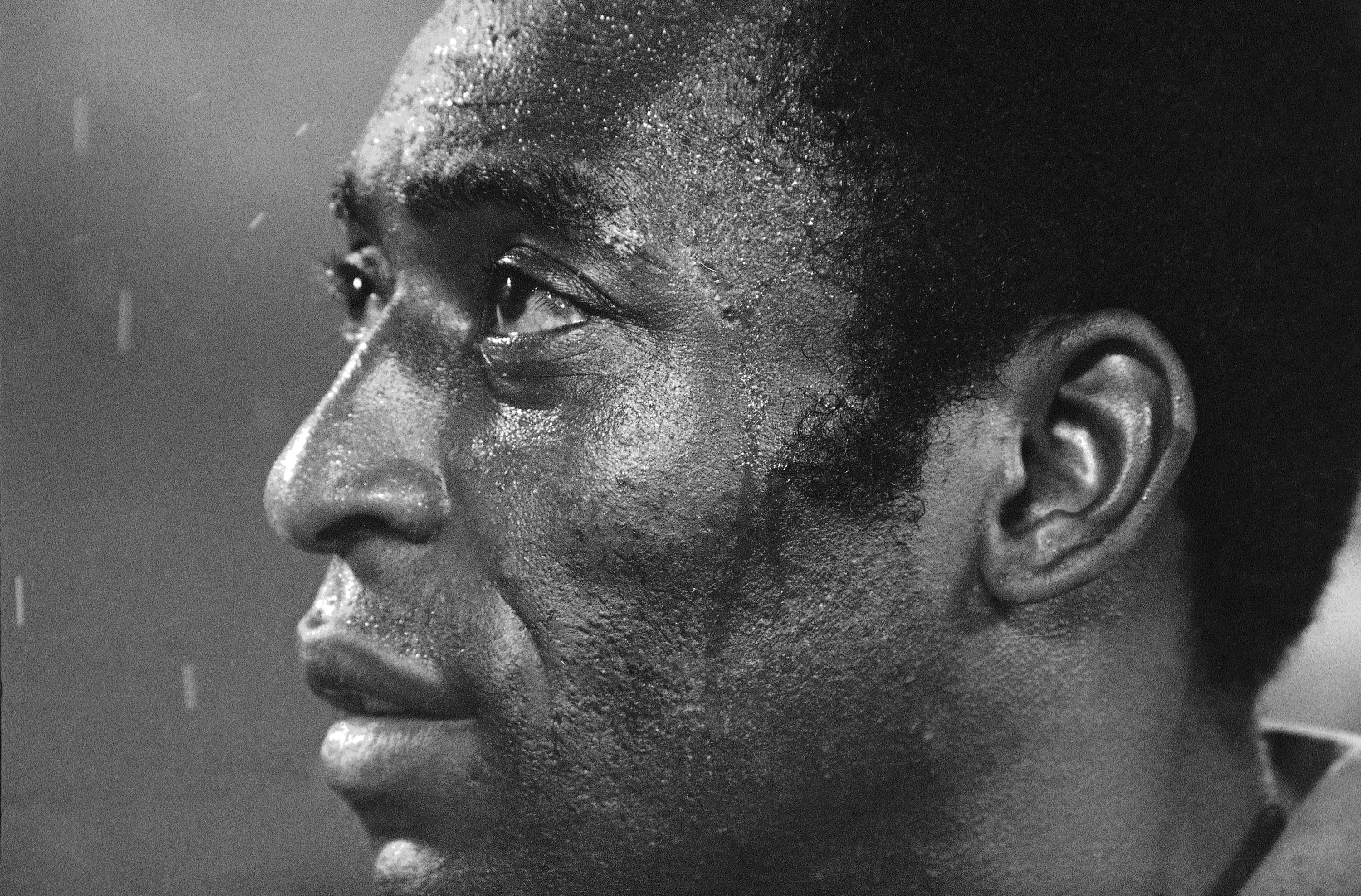 Soccer star Pele, of the New York Cosmos, listens to the star-spangled banner prior to a playoff game between the Cosmos and the Rochester Lancers in Giants Stadium, East Rutherford, New Jersey, Aug. 24, 1977.