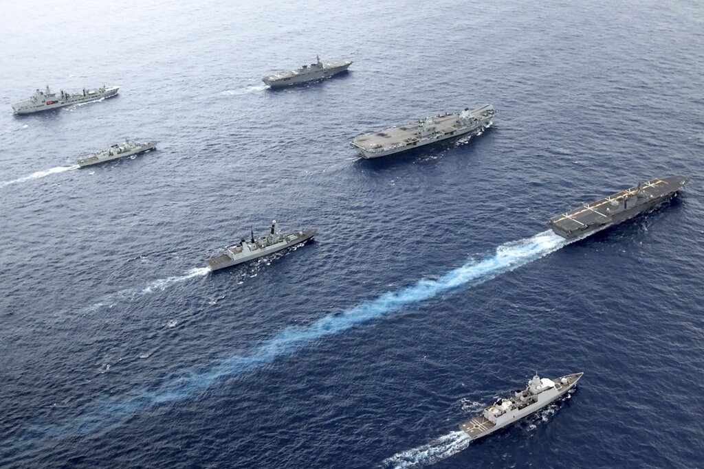 . UK Royal Navy Carrier Strike Group 21 HMS Queen Elizabeth, HMS Defender, RFA Tidespring and HNLMS Evertsen from CSG21 sails with Japanese ships JS Izumo and JS Ise along with the Canadian ship HMCS Winnipeg in the Pacific Ocean, Sept. 2021. With increasingly strong talk in support of Taiwan, a new deal to supply Australia with nuclear submarines, and the launch of a European strategy for greater engagement in the Indo-Pacific, the U.S. and its allies are becoming growingly assertive in their approach toward a rising China.