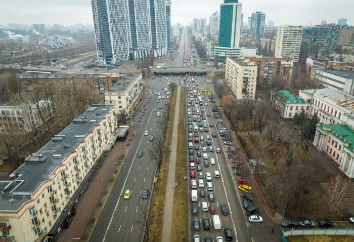 Civil defense sirens wailed in the air of the capital, Kyiv, in the gray and drizzly morning, but the city's main street Khreshchatyk was a mixture of anxiety and normalcy.