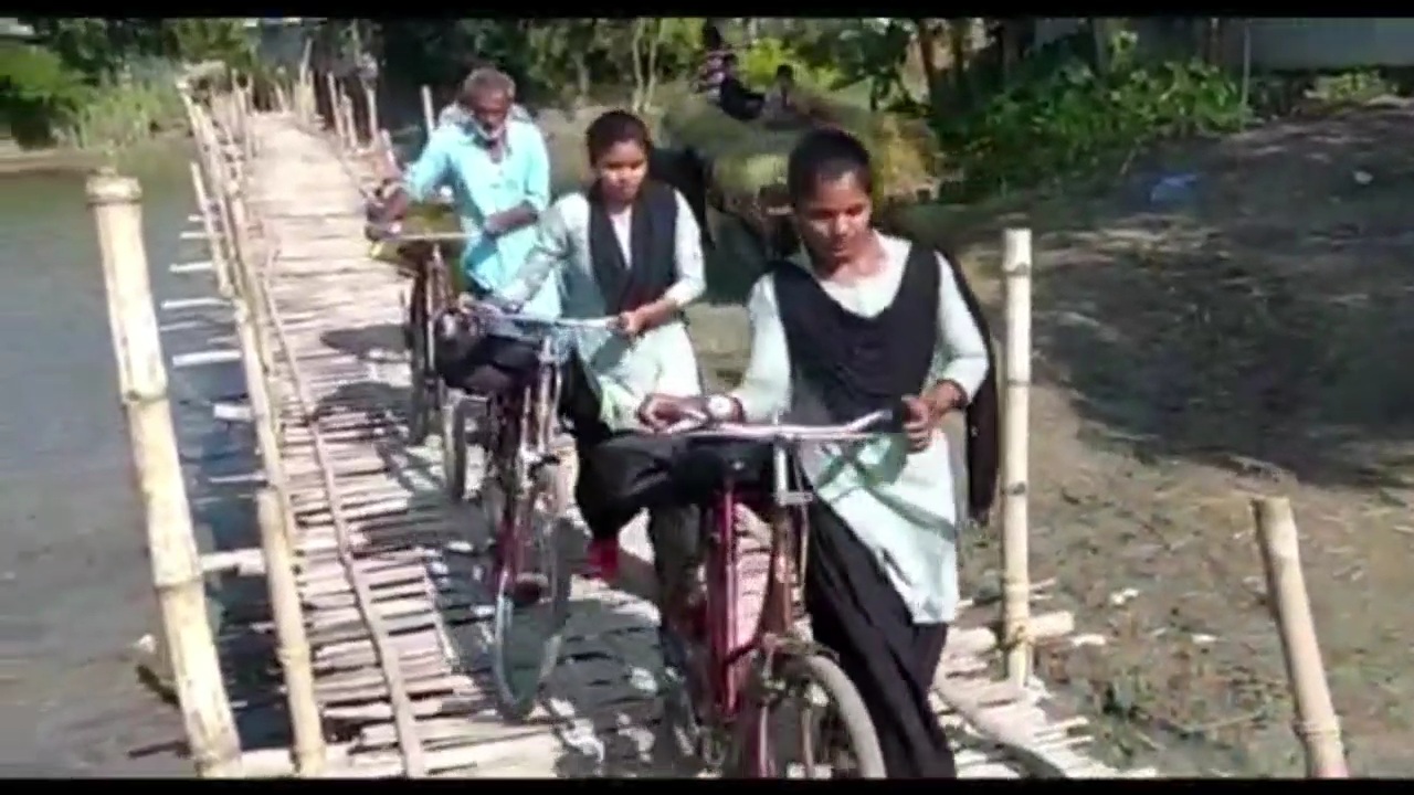 BROKEN  BAMOO BRIDGE AT DHUBURI