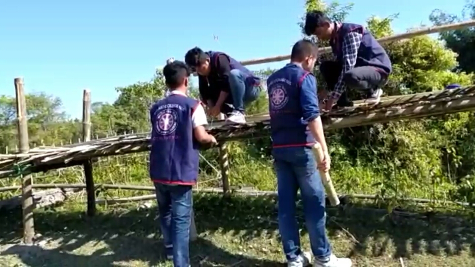 majuli college nss team constructed a bamboo bridge