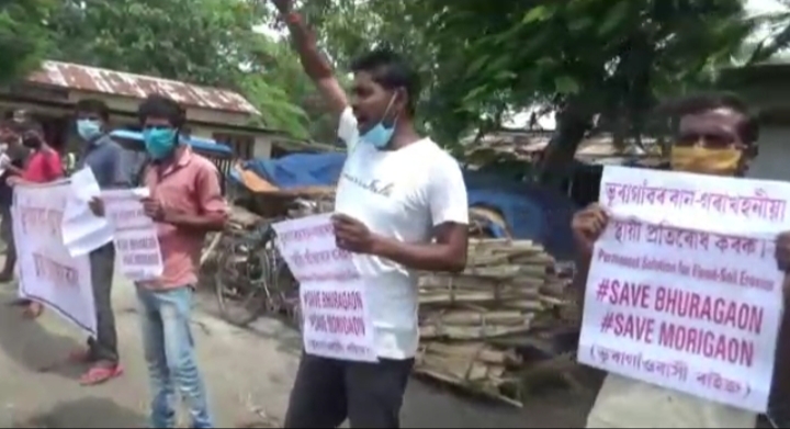 Morigaon human chain protestd