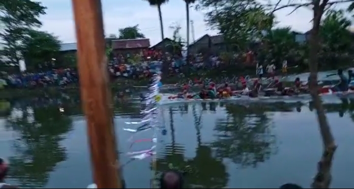 by breaking covid protocol boat race organised at morigaon