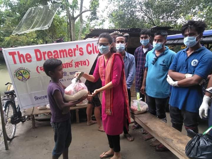 relief-distribution-by-the-dreamers-club-at-nalbari