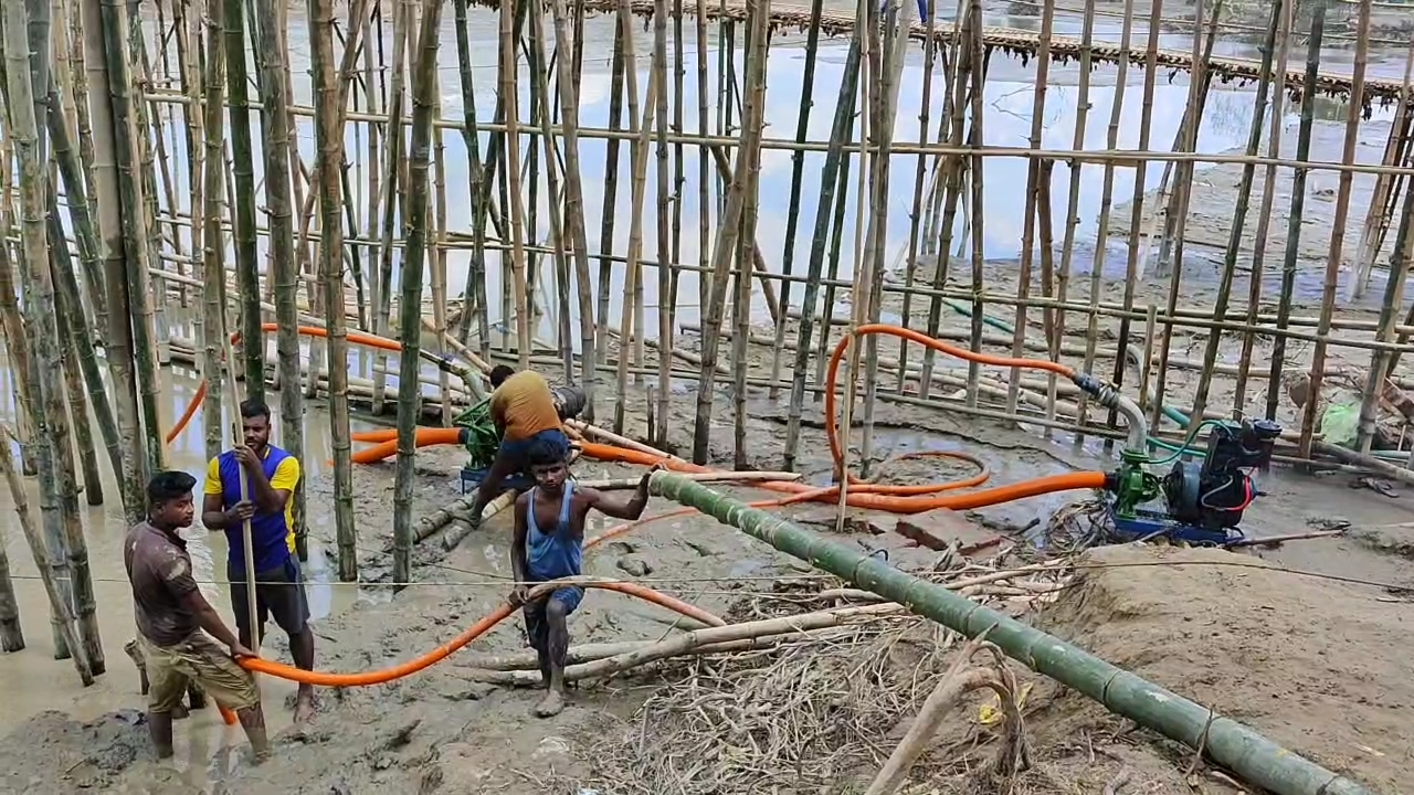 Reconstruction of broken dam in Rangia