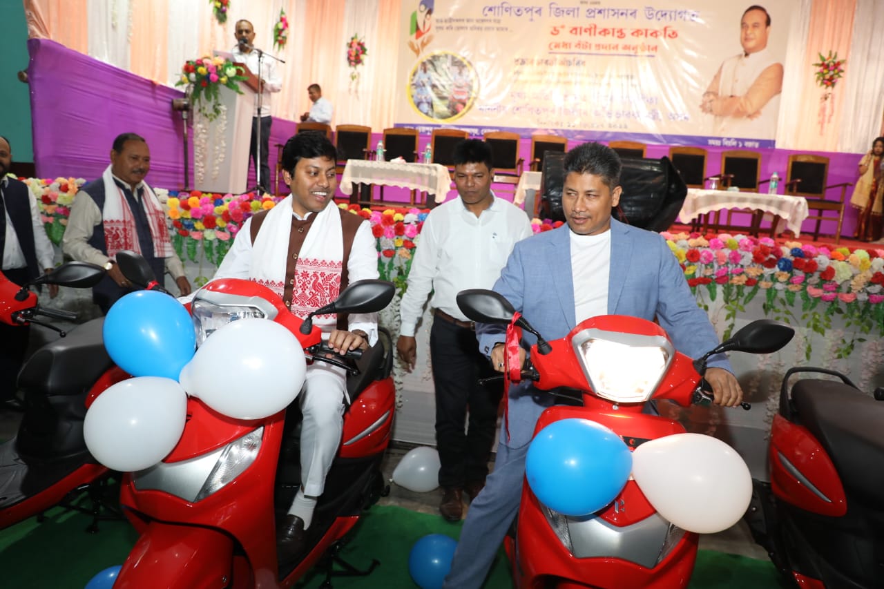 Minister Pijush Hazarika distributes scooty among students