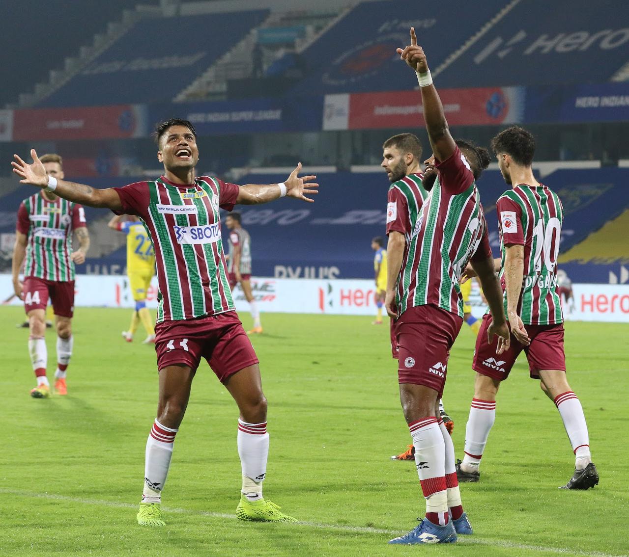 Pritam Kotal and Roy Krishna celebrate ATK Mohun Bagan's victory against Kerala Blasters in the ISL 2020-21 season opener.