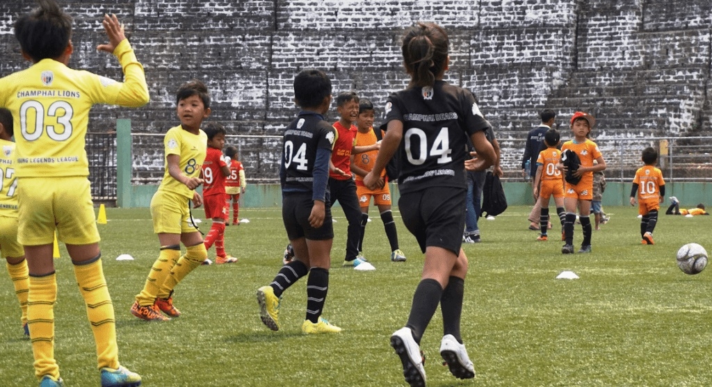 Young boys and girls participate in the Golden Baby League.